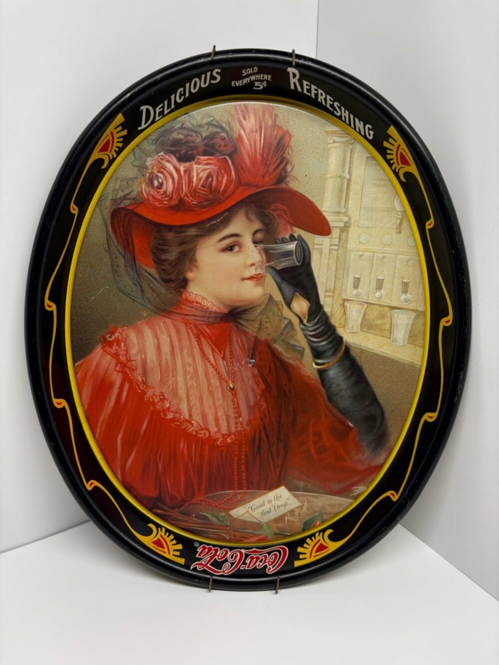 Vintage oval Coca-Cola metal serving tray featuring the iconic "1908 Calendar La